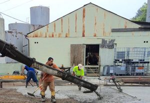 Pouring concrete from filler